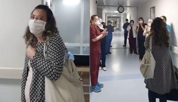 Koronavirüsü yenen hemşire meslektaşlarının alkışlarıyla, ağlayarak hastaneden ayrıldı