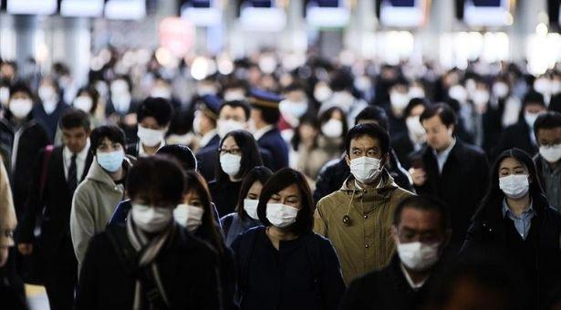 Japonya, tırmanışa geçen koronavirüs vakaları için 'maksimum uyarı' durumunda